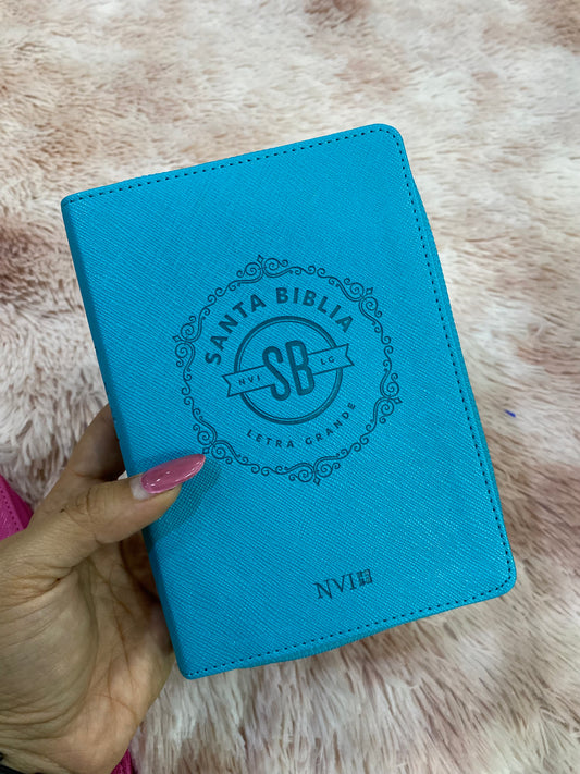 Biblia versión NVI de bolsillo con cierre y palabras de Jesús en rojo