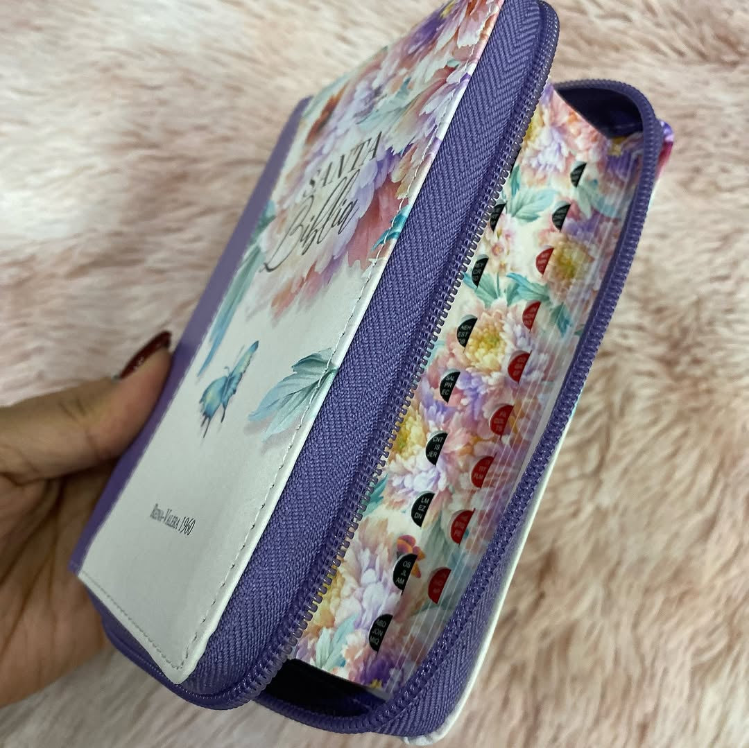 Biblia tamaño bolsillo letra mediana 8 puntos con cierre índice y canto floreado versión RV60 con concordancia